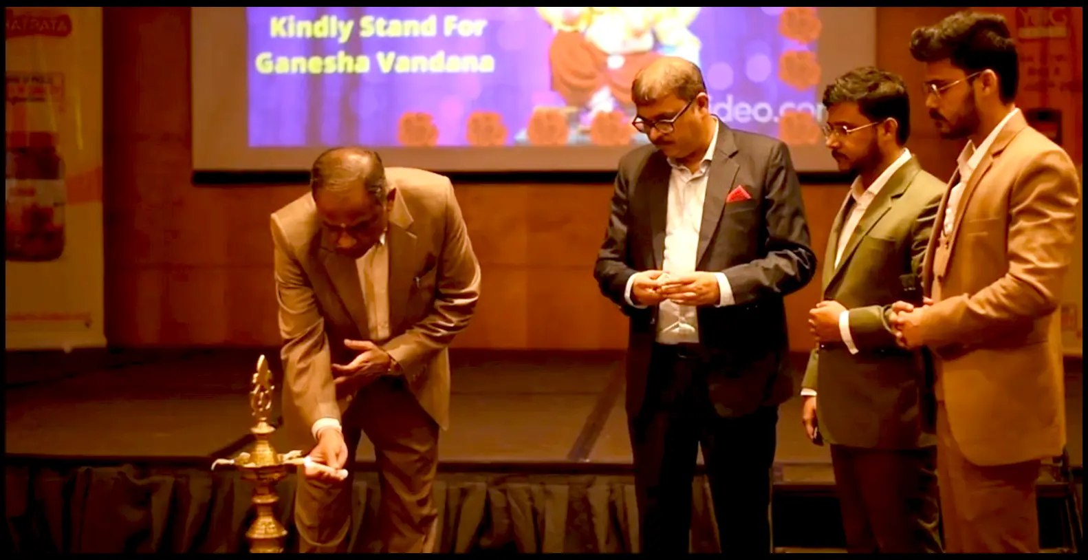 archita Essentials Compony members lighting the Candle